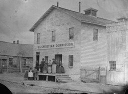 Group in Front of U.S. Christian Commission Storehouse