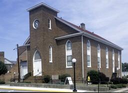 First Baptist Church in Farmville was founded in 1867 by the Black residents of the town, who wished to have their own place of worship. The building was constructed around 1895, in an example of Late Gothic Revival architecture. 