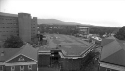 This photograph, taken on December 17, 1974, shows the construction of the Claude Moore Health Sciences Library at the University of Virginia. The construction of the library, along with the expansion of the UVA Medical Center, encroached on the historically Black Charlottesville community of Gospel Hill. By 1984, the community was demolished, replaced by medical center buildings and parking lots.  