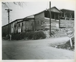 <p>This undated photograph shows a corner of Garrett Street in Charlottesville before it was bulldozed in 1973. This was the last neighborhood targeted for urban renewal by the city.</p> 