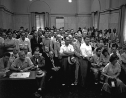 <p>A packed audience listens to a presentation from the Norfolk Redevelopment and Housing Authority (NRHA) held on September 10, 1951. The audience is segregated, with Black attendees sitting or standing in the back of the room.</p>