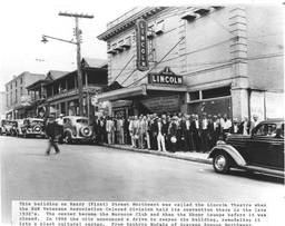 <p>A group of men, members of the Norfolk & Western Veterans’ Association Colored Division, pose for a group photo in front of the Lincoln Theatre on Henry Street in Gainsboro.</p>